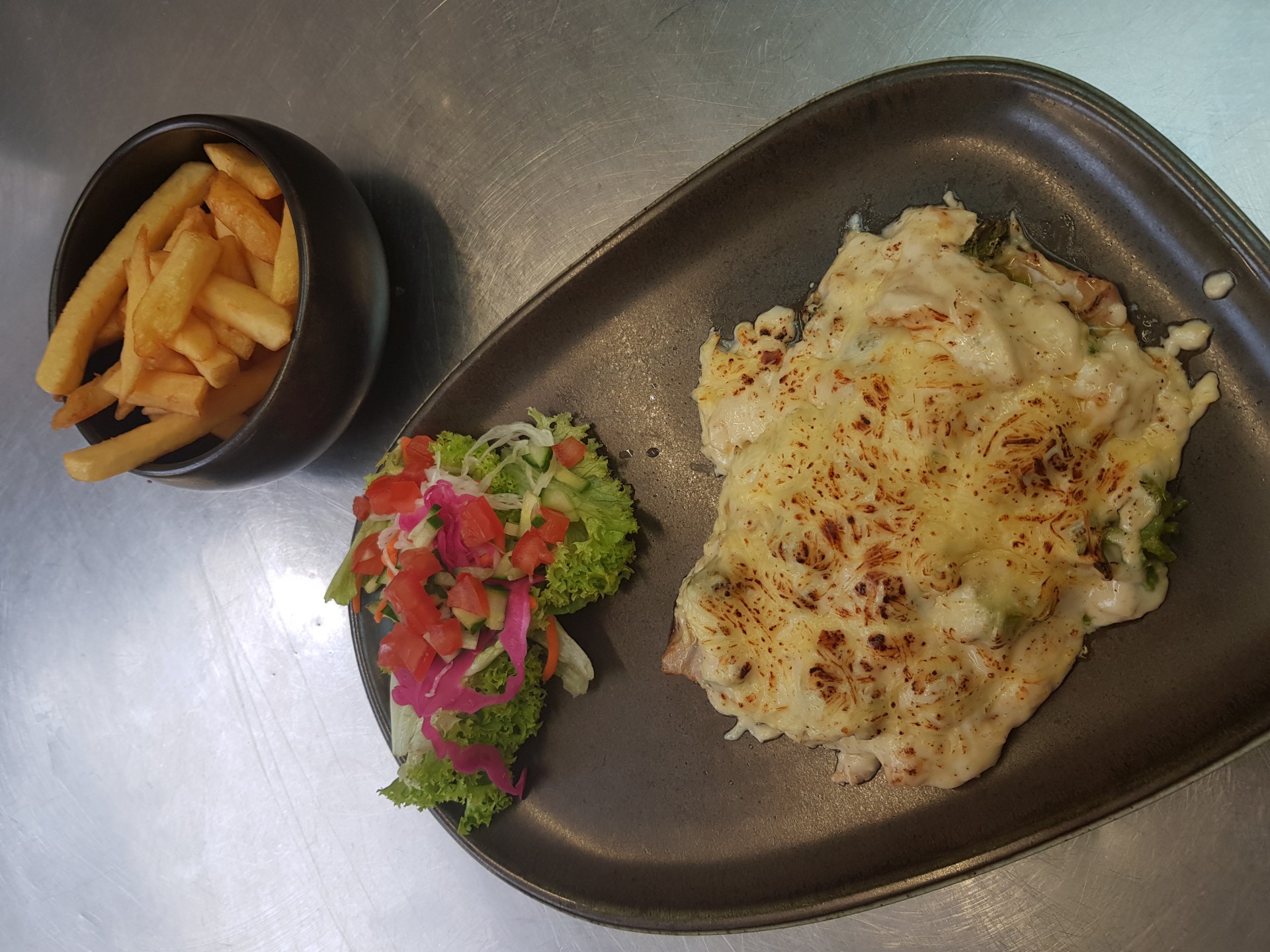 Emince de porc aux brocolis gratine